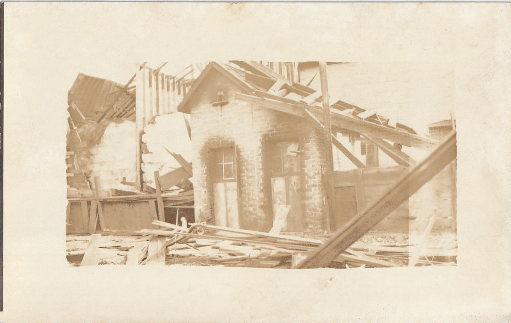 Building Torn to Pieces - Tornado Aftermath - Natural Disaster - RPPC, c. 1900s