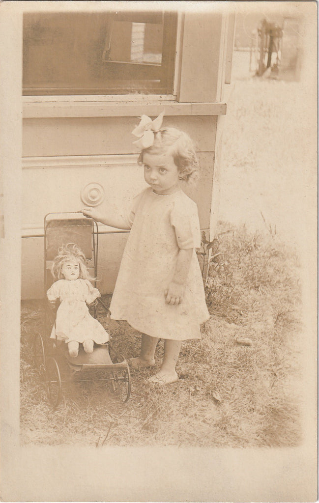 Scary Dolly in Stroller - RPPC, c. 1910s