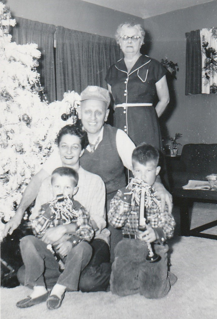 Noise-makers - Christmas at Grandparent's - Photo, c. 1950s Close UP