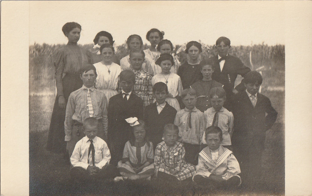 Pleasant Hill Elementary School - Creepy Twins - RPPC, c. 1910s