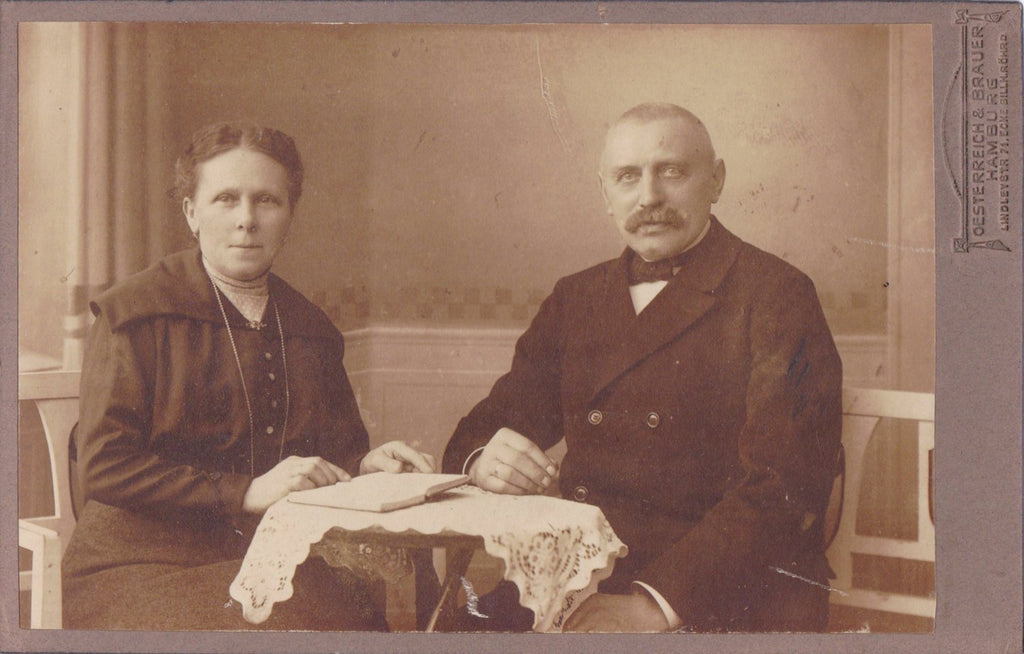 By The Book- 1900s Antique Photograph- Edwardian Couple- Open Book- Mustache Man- Hamburg, Germany- Cabinet Photo- Paper Ephemera