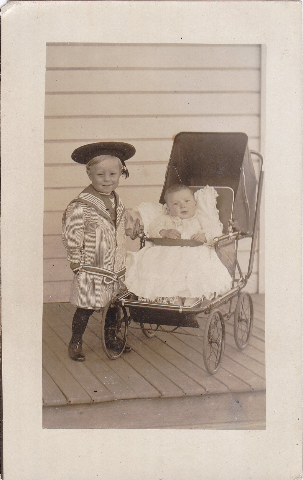 Early 1900s postcard photo of 2 infants in baby carriage Early 1900s postcard photo of 2 infants in baby carriage